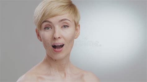 Profile Portrait Of Attractive Mature Lady Turning Face To Camera And