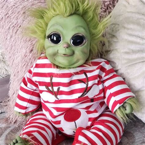 These Baby Grinch Dolls Are Beyond Realistic and Festive for Christmas