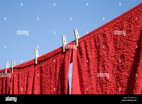 Red Towels On A Clothesline Stock Photo Alamy