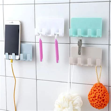 Wall Mount Mobile Phone Storage Holder Adhesive Stand Socket Charging