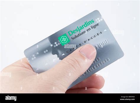 A Desjardins Debit Card Over A White Background Stock Photo Alamy