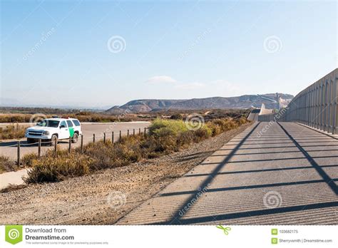 Us Border Patrol Vehicle Patrolling Near San Diegotijuana Border