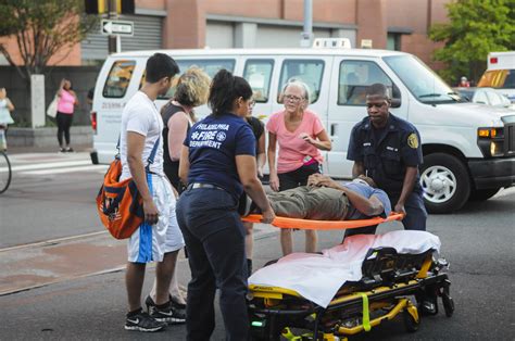 Photo gallery: man hit by car on 38th and Walnut, taken to hospital