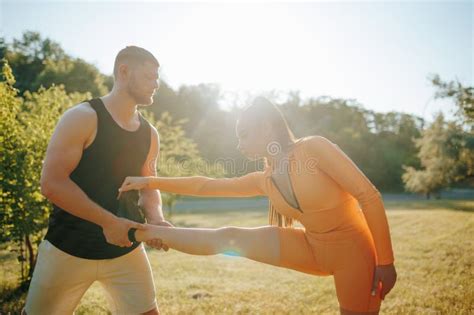 Healthy Exercise Personal Trainer Helps Male And Female Athletes Stay