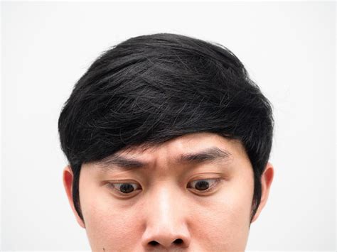 close  face asian man   portrait head shot  stock