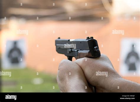 Man Shooting Pistol