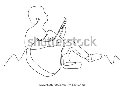 Continuous Line Drawing Sitting Guitarist Playing เวกเตอร์สต็อก ปลอดค่าลิขสิทธิ์ 2113386443