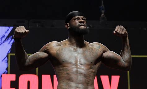 Tyson Fury, Deontay Wilder weigh in big for their big heavyweight fight ...