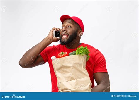 Delivery Concept Portrait Of Handsome African American Delivery Man