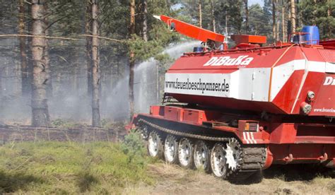 greek firefighters battle wildfires  converted battle tank