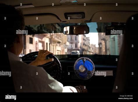 Taxi cab interior view from the backseat driving through Havana, Cuba ...