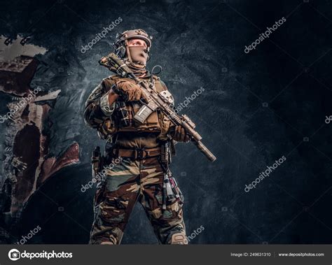 Elite unit, special forces soldier in camouflage uniform posing with ...