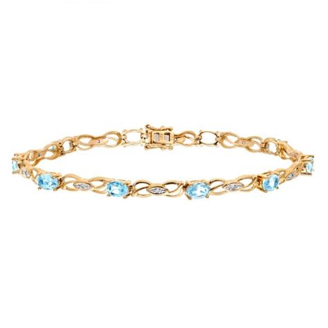 Sparkld Ct Yellow Gold Oval Blue Topaz And Ct Diamond Bracelet