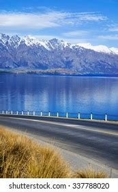 Asphalt Road Lake Mountain Range Concept Stock Photo 337788020