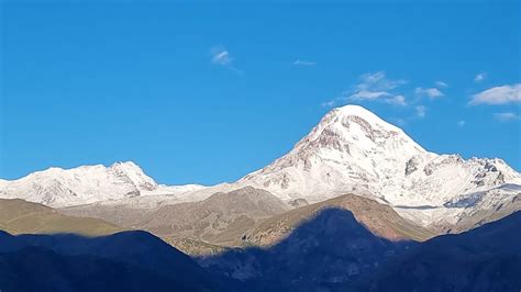 Majestic Snow-Capped Mount Kazbek Peak - backiee