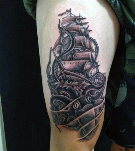 Little Black Ink Squid With Sailing Ship Tattoo On Thigh Tattooimages