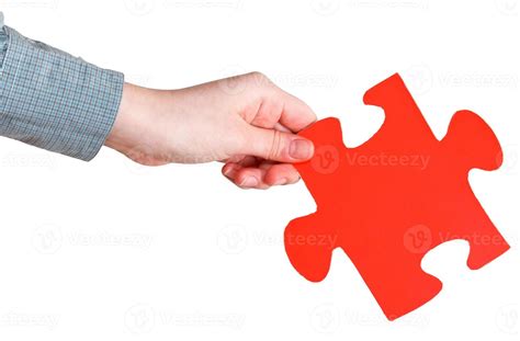 Female Hand Holding Big Red Paper Puzzle Piece 11907401 Stock Photo At