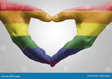 Hands Painted As The Rainbow Flag Forming A Heart Stock Photo Image