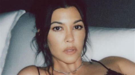 Kourtney Kardashian Almost Busts Out Of Plunging Lace Lingerie In Racy