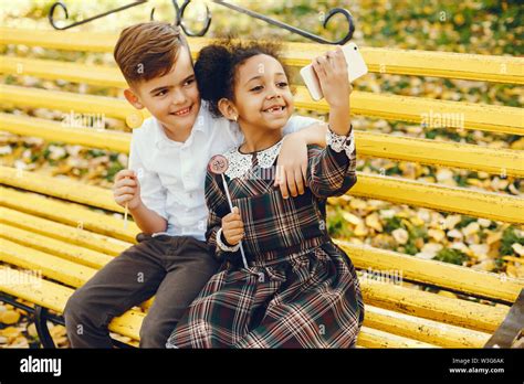 children in a park Stock Photo - Alamy