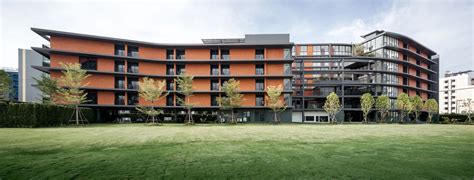 Orange Dormitory With Many Balconies