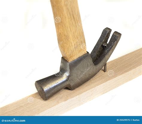 Hammer Removing Nail Royalty Free Stock Photo - Image: 25529975