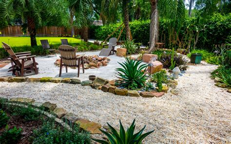 Tropical Backyard Paradise With Sand Landscaping