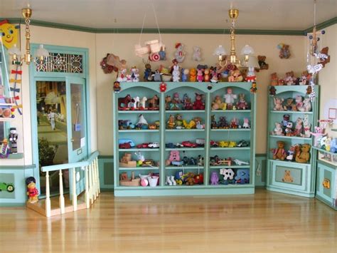 There Are Many Toys On The Shelves In This Room