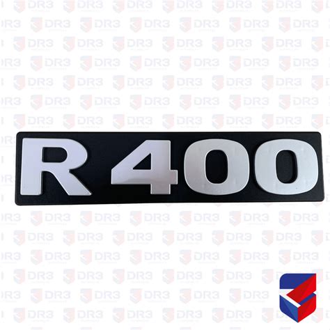 Emblema Frontal R400 Scania S4 1724050 1227S Loja DR3