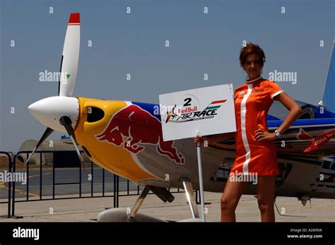 Red Bull Air Race pilots with their planes Turkish promo girls on Red ...