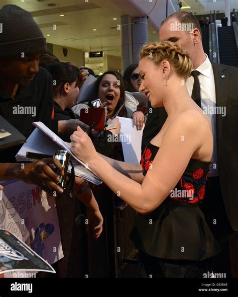 Scarlett Johansson Signs Autographs For Fans At The Marvel Avengers