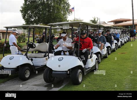 Marines With 3rd Marine Aircraft Wing Load Into Golf Carts To Begin A