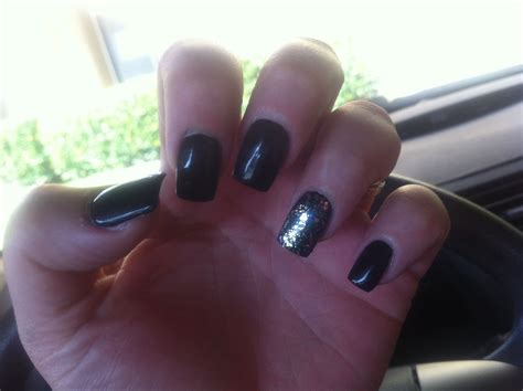 Black with a touch of gold sparkle nails | Gold sparkle nails, Sparkle ...