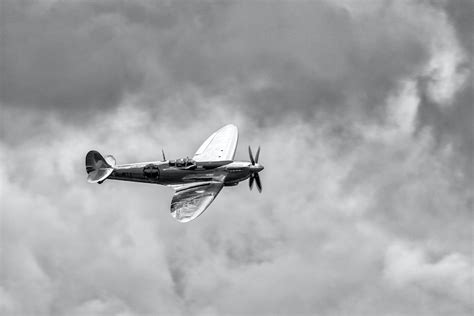 The Silver Spitfire Wallpaper | Happywall