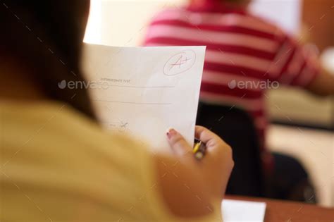 Papers With Good Grades For Smart Student At School Stock Photo By