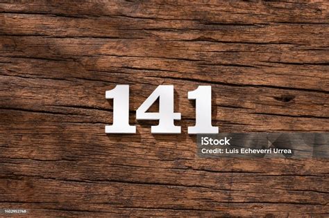 Number 141 In Wood Isolated On Rustic Background Stock Photo - Download ...