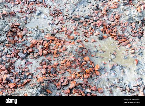 manualy mixing broken bricks pile   sand pile  cement powder