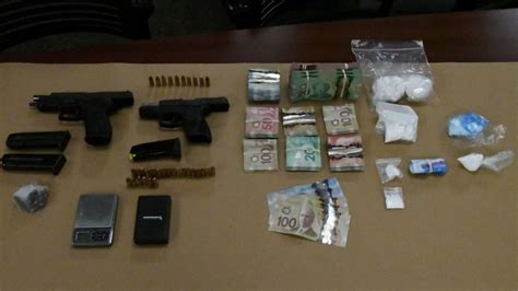 Guns Drugs And Cash Seized In Raids At Two Separate London Ont Homes