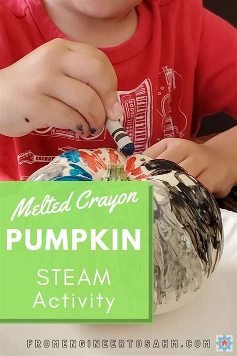 A Young Boy Is Painting A Pumpkin On A White Plate With The Words