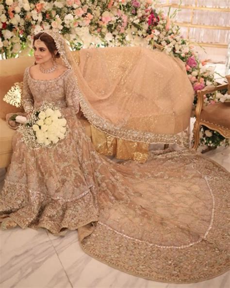 Pakistani Golden Designer Walima Gown With Embroidered Long Trail