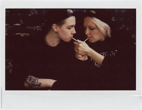 Cool Lesbian Couple Smoking By Stocksy Contributor Alexey Kuzma Stocksy