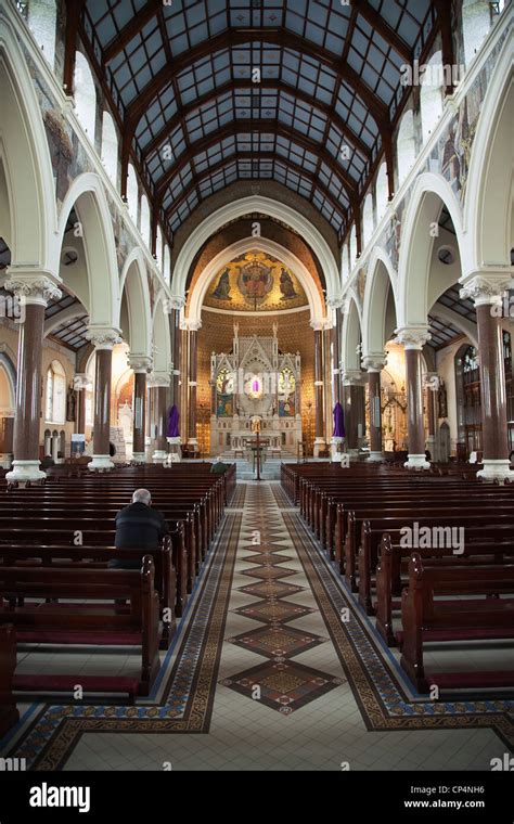 Ireland, North, Belfast, Falls Road, Clonard Monastery interior decorated for Good Friday with ...