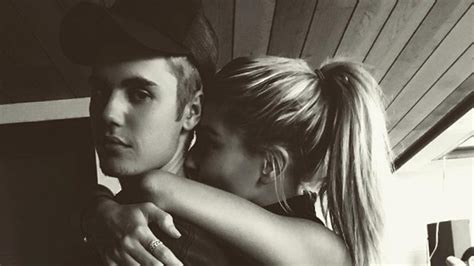 Justin Bieber Seals Hailey Baldwin Relationship Gossip With A Kiss Entertainment Tonight