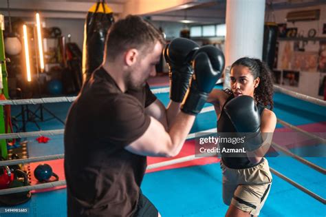 Diverse Male And Female Boxers Spar Fighting High Res Stock Photo