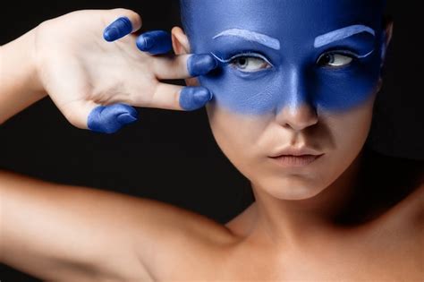Free Photo Portrait Of A Woman Posing Covered With Blue Paint