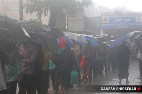 Imd Issues Red Alert For Mumbai As Downpour Continues Waterlogging In