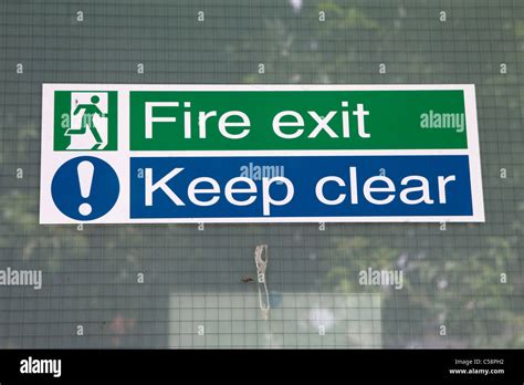 Uk British Fire Exit Keep Clear Safety Door Sign Stock Photo Alamy