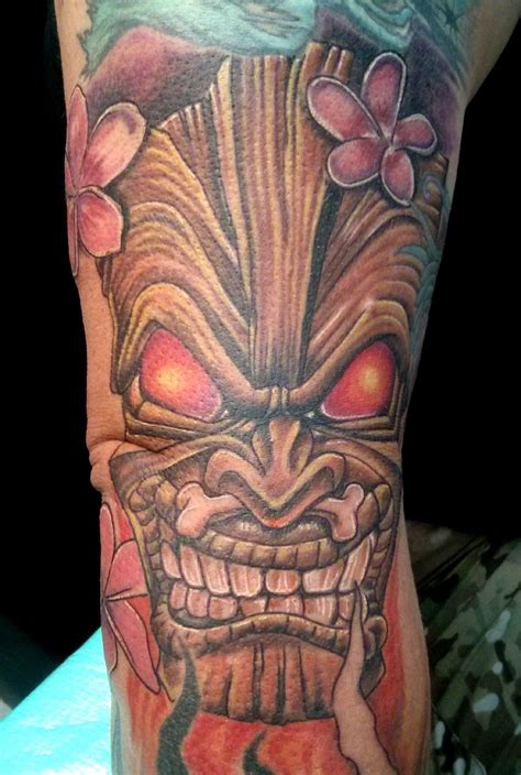 Tiki Mask Tattoo With Plumeria Hand Tattoos Pictures Hand Tattoo