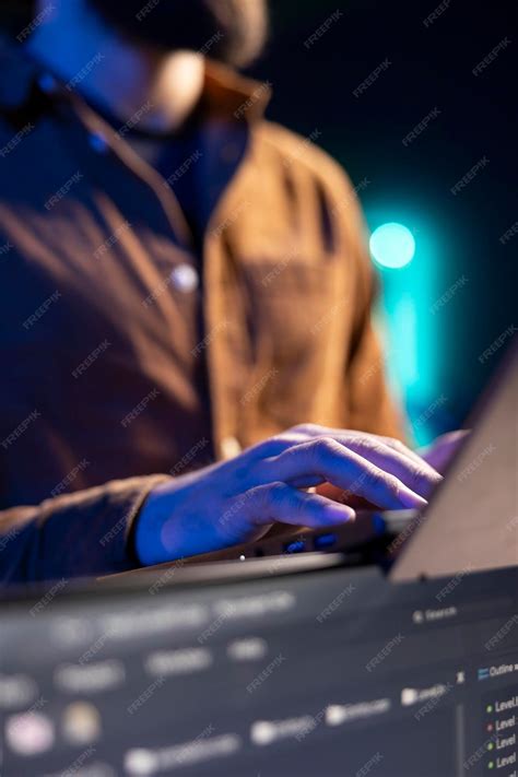 Free Photo | IT admin in apartment fixing coding issues using laptop