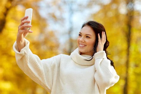 Woman Taking Selfie By Smartphone At Autumn Park Stock Image Image Of